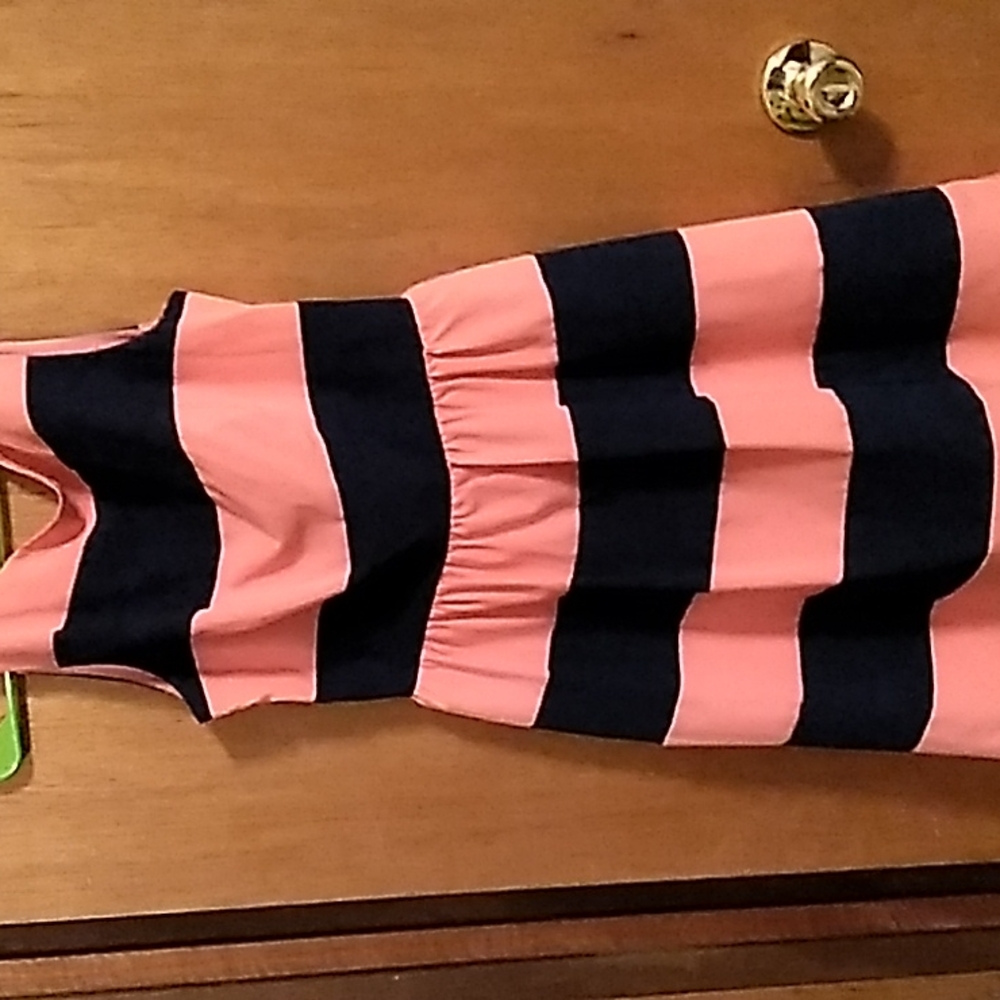 B.Smart navy blue and salmon striped dress